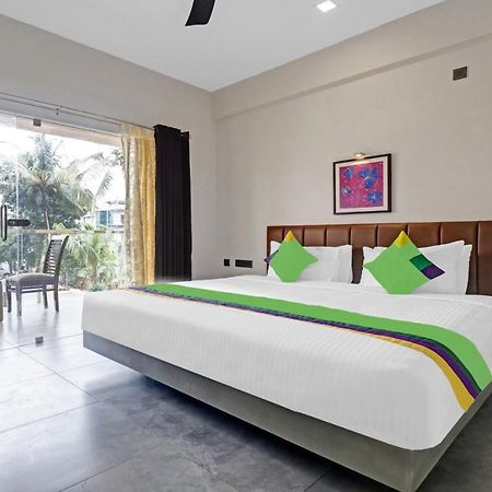 Treebo Grand Vistara Airport Suites Kochi ภายนอก รูปภาพ
