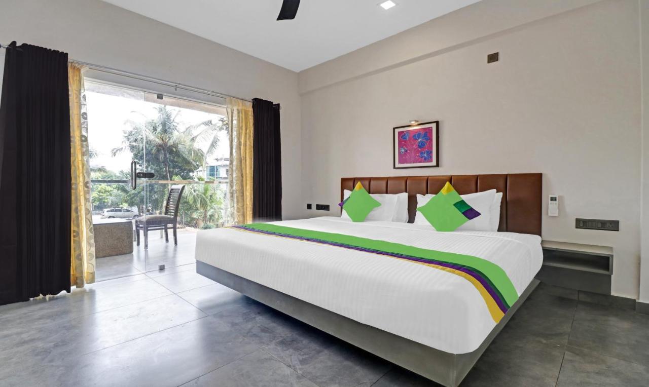 Treebo Grand Vistara Airport Suites Kochi ภายนอก รูปภาพ