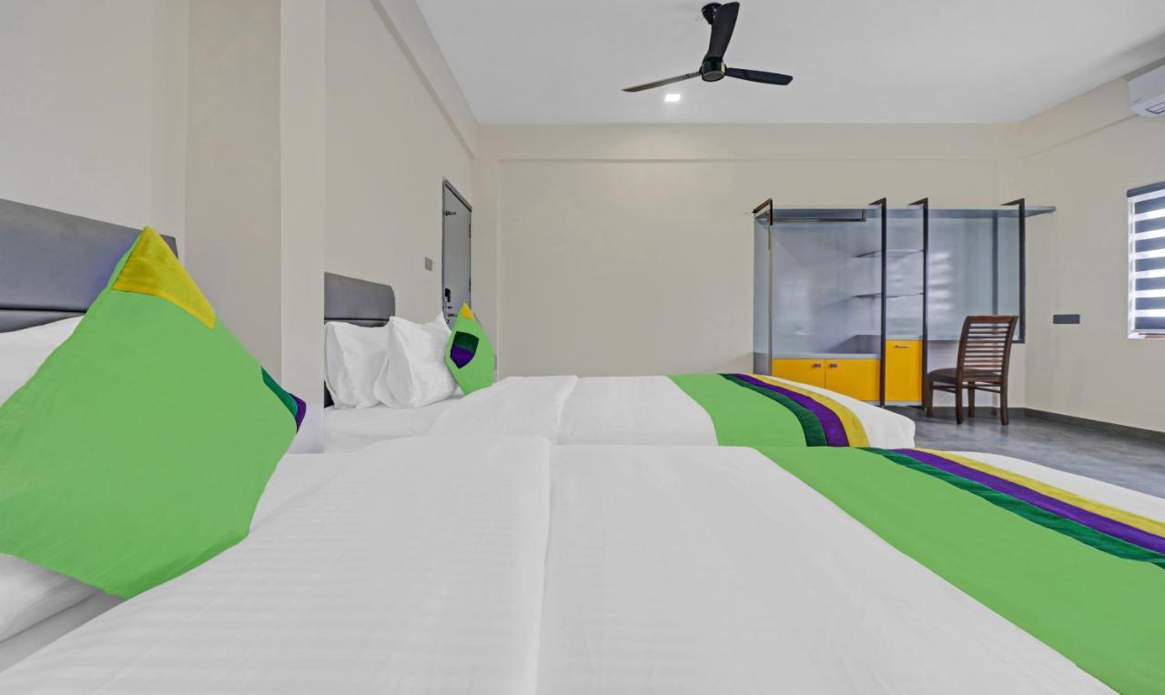 Treebo Grand Vistara Airport Suites Kochi ภายนอก รูปภาพ