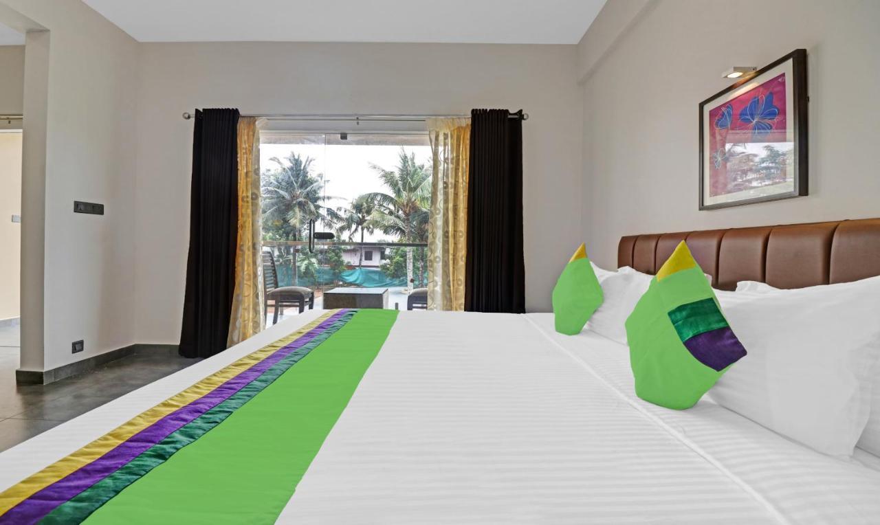 Treebo Grand Vistara Airport Suites Kochi ภายนอก รูปภาพ
