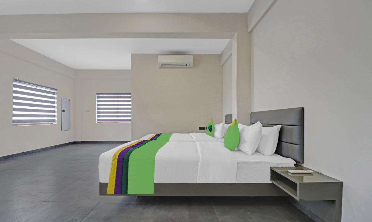Treebo Grand Vistara Airport Suites Kochi ภายนอก รูปภาพ
